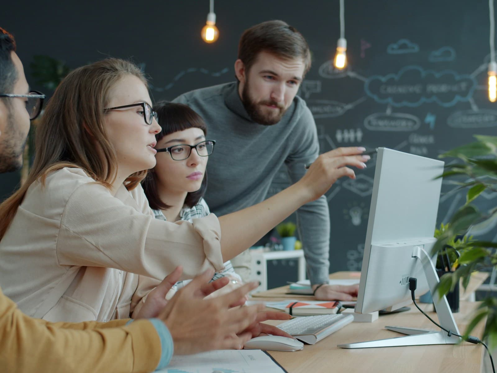The ArabNex engineering team reviewing a project together